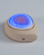 The model wearing Blyss Mira – Photon LED & High-Frequency Vibration Facial Device