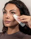 The model wearing Blyss Lila – RF, EMS & Photon Eye Revitalizer